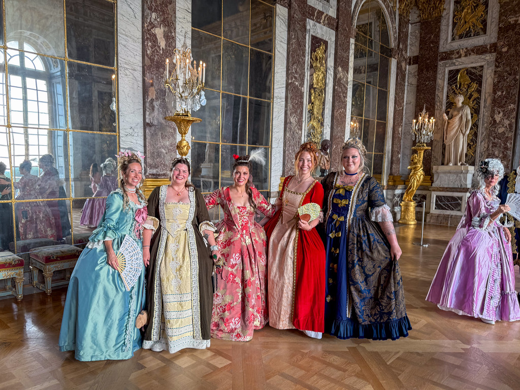 Women in costume for the Versailles Grand Masked Ball